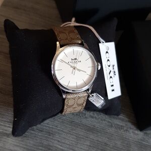 Coach Womens Silver Case Watch with Signature Brown Canvas Strap